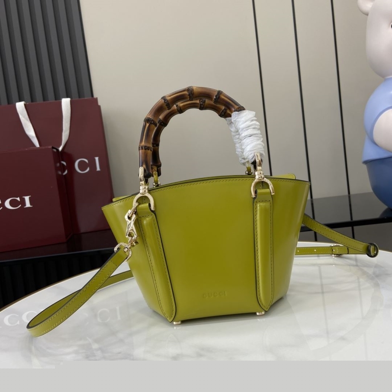 G*u*i top handle bags